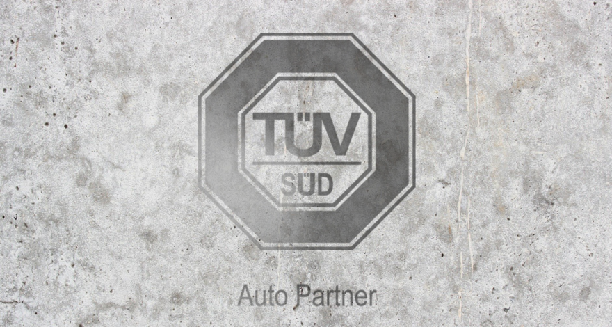 TÜV SÜD Auto Partner Logo im Beton Look